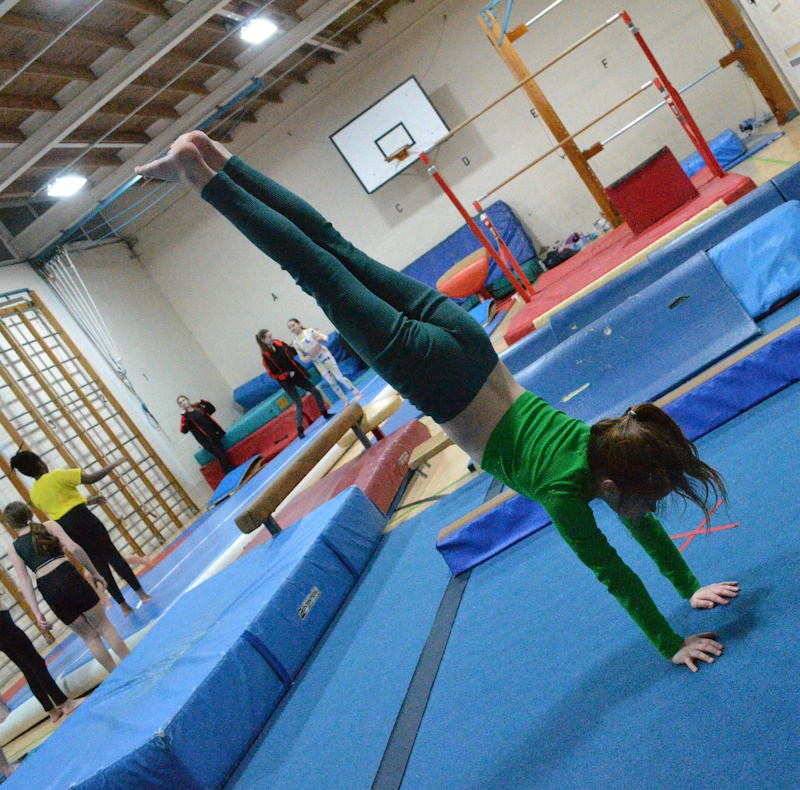 gymnast doing handstand